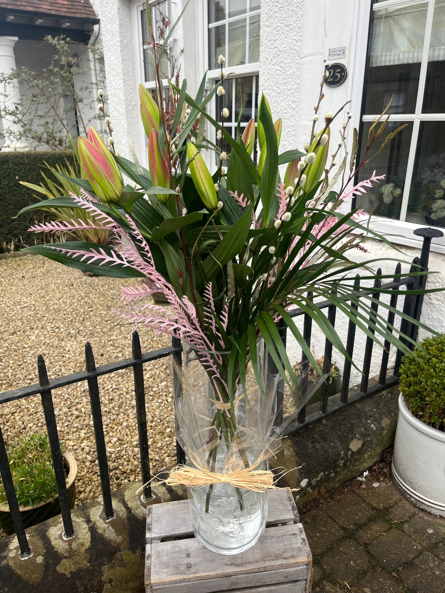 Tall Pink Lily & Palm Arrangement