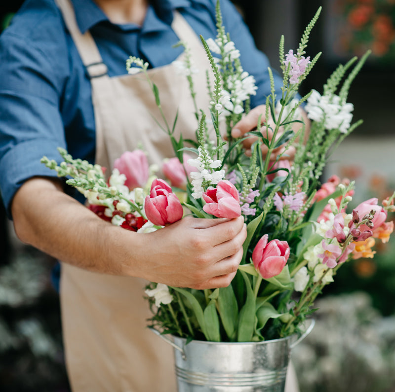 Florist arranging flowers